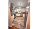 Modern kitchen features stainless steel appliances, white cabinetry, and a stylish backsplash creating an inviting space at 2089 Lenox Rd, Atlanta, GA 30324