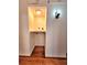 Convenient laundry closet featuring wooden floors at 2089 Lenox Rd, Atlanta, GA 30324