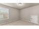 Bedroom with carpet and lots of natural light from the window at 2172 Misty Brook Ct, Buford, GA 30519