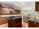 Well-equipped kitchen featuring granite countertops, an island, and stainless steel appliances at 2172 Misty Brook Ct, Buford, GA 30519
