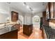 Bright kitchen with granite countertops, stainless steel appliances, and hardwood flooring at 2172 Misty Brook Ct, Buford, GA 30519