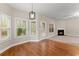 Comfortable living space featuring lots of natural light and a cozy fireplace at 2172 Misty Brook Ct, Buford, GA 30519