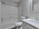 Bathroom with modern vanity, sink, toilet and shower/bath combo at 5570 Downs Way, Lithonia, GA 30058