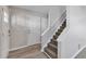 Inviting foyer with neutral paint, durable flooring, and staircase access to the upper level at 5570 Downs Way, Lithonia, GA 30058