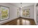 Bright bedroom with hardwood floors, bright windows, and white walls with light trim at 791 Woodland Se Ave, Atlanta, GA 30316