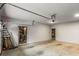 Spacious and clean garage with a door leading to the home's interior and ample space for parking and storage at 791 Woodland Se Ave, Atlanta, GA 30316