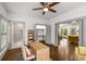 Home office with views, hardwood floors, and access to the bathroom and dining room at 791 Woodland Se Ave, Atlanta, GA 30316