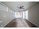 Bedroom featuring plush carpet, neutral walls, ceiling fan, and natural light, ready for personal touches at 1753 Thomas Ter, Decatur, GA 30032