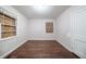 Cozy bedroom with wood-look floors and neutral walls, ready for personalization at 1753 Thomas Ter, Decatur, GA 30032