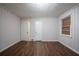 This bedroom has new flooring, neutral walls, and an abundance of natural light at 1753 Thomas Ter, Decatur, GA 30032