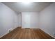 Bedroom with hardwood floors, offering a bright space with two entry doors at 1753 Thomas Ter, Decatur, GA 30032