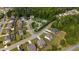 Aerial view of a suburban neighborhood with lush greenery, community pool, playground, and well-kept homes at 312 Amble Side, Mcdonough, GA 30252