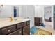 Bathroom with a double vanity and access to the themed bath at 312 Amble Side, Mcdonough, GA 30252