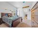 Bedroom featuring carpeted floors and ample natural light at 312 Amble Side, Mcdonough, GA 30252