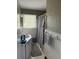 Bathroom with a combination tub and shower, vanity, and white subway tile at 3674 Canton Rd, Marietta, GA 30066