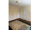 Bedroom featuring hardwood floors, neutral walls, and a window for natural light at 3674 Canton Rd, Marietta, GA 30066