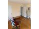 The bedroom has wood floors, neutral walls, and closet access at 3674 Canton Rd, Marietta, GA 30066