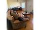 Inviting living room with classic hardwood floors and comfortable furnishings at 3674 Canton Rd, Marietta, GA 30066