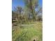 Residential lot featuring mature trees, vegetation, and potential for development and landscaping at 3674 Canton Rd, Marietta, GA 30066