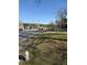 Street view with a fire hydrant on the shoulder with grass and a road with cars driving at 3674 Canton Rd, Marietta, GA 30066