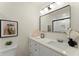 Stylish bathroom with a modern vanity, sleek mirror, and elegant fixtures at 1990 Venetian Sw Dr, Atlanta, GA 30311