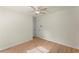 Simplified bedroom featuring light wood flooring and neutral paint at 1990 Venetian Sw Dr, Atlanta, GA 30311