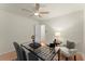 Well-lit home office with a neutral color scheme and a view to other rooms at 1990 Venetian Sw Dr, Atlanta, GA 30311