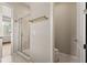 Bathroom featuring glass-enclosed shower, toilet, and contemporary design at 6812 Cadence Blvd, Atlanta, GA 30328