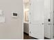 Hallway with a half bathroom and access to other rooms at 6812 Cadence Blvd, Atlanta, GA 30328