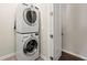 Convenient laundry room with stacked washer and dryer at 6812 Cadence Blvd, Atlanta, GA 30328