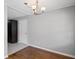 Dining space with hardwood floors, neutral walls, and overhead lighting, creating a cozy and inviting atmosphere at 131 Brownlee Rd, Atlanta, GA 30331