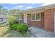 Charming brick home with a well-maintained lawn and inviting entrance, showcasing classic curb appeal at 131 Brownlee Rd, Atlanta, GA 30331