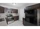 Cozy kitchen with stainless steel appliances, updated cabinets, and modern backsplash at 131 Brownlee Rd, Atlanta, GA 30331