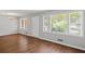 Bright and airy living room with hardwood floors, neutral walls and large windows, ideal for relaxation and entertaining at 131 Brownlee Rd, Atlanta, GA 30331
