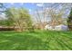 Large, well-maintained backyard offers ample space with mature trees and potential for outdoor enjoyment at 2491 Falcon Ridge Dr, Grayson, GA 30017