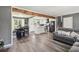 Open concept living room with view of kitchen and dining area at 2491 Falcon Ridge Dr, Grayson, GA 30017