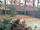 Backyard featuring a well-maintained lawn and modern privacy fence at 407 Johnson Ct, Alpharetta, GA 30009