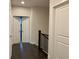Upstairs hallway with doors and railing at 407 Johnson Ct, Alpharetta, GA 30009