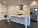Open-concept kitchen with stainless steel appliances, island and pendant lighting at 407 Johnson Ct, Alpharetta, GA 30009