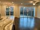 Open-concept living room filled with natural light and access to the backyard at 407 Johnson Ct, Alpharetta, GA 30009
