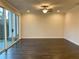 Spacious and bright living room with sliding glass doors leading to the backyard at 407 Johnson Ct, Alpharetta, GA 30009