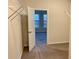 Walk-in closet with carpet and wire racks looking through a door into a bedroom at 407 Johnson Ct, Alpharetta, GA 30009