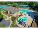 Gorgeous community pool area featuring a slide, a fountain, and a competition swimming pool at 7940 Royal Melbourne Way, Duluth, GA 30097