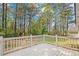 Outdoor deck perfect for entertaining, surrounded by lush greenery at 10331 Wrens Dr, Jonesboro, GA 30238