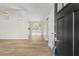 Open entryway showcasing new flooring and a glimpse of the dining area at 10331 Wrens Dr, Jonesboro, GA 30238