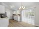 Modern kitchen with updated cabinets, stainless appliances, and sliding patio doors at 10331 Wrens Dr, Jonesboro, GA 30238