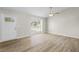 Bright living room with ample natural light, new floors, and neutral paint at 10331 Wrens Dr, Jonesboro, GA 30238