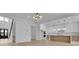 Spacious open floor plan showcases modern kitchen, staircase, and living area at 315 Hillcrest View Drive, Suwanee, GA 30024