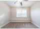 Bedroom featuring a window with blinds and a seat ledge along the wall at 4915 Wycliffe Dr, Stone Mountain, GA 30087