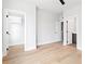 Bedroom with hardwood floors, closet, and adjacent bathroom at 7210 Summit Pl, Alpharetta, GA 30009